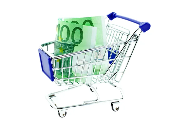 Winkelwagentje met 100 euro-bankbiljetten geïsoleerd — Stockfoto