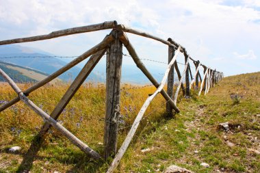 Beautiful wooden fence in the Apennines clipart