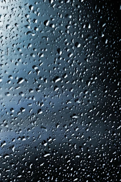 Water droplets as colored background — Stock Photo, Image