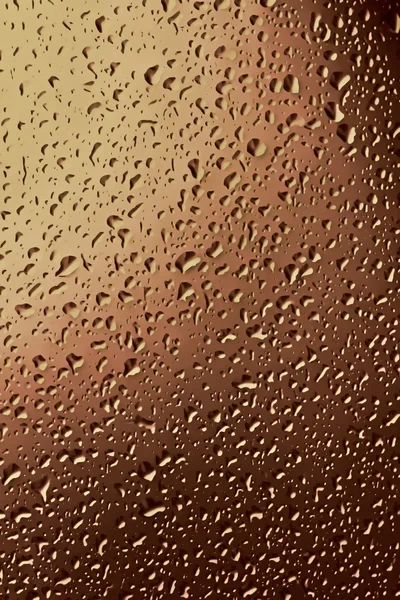 Vattendroppar som färgad bakgrund — Stockfoto