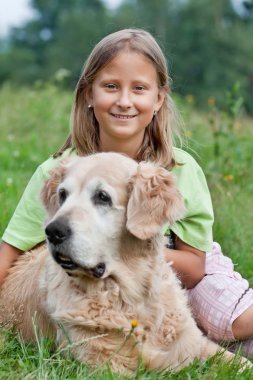 Little girl and her beloved dog clipart