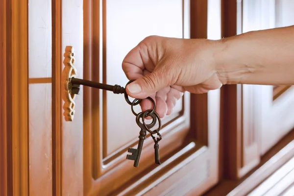 Stock image Hand holds a key