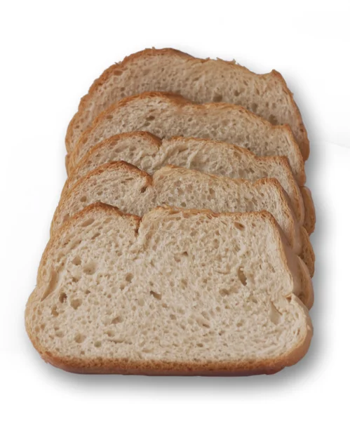 Pão fatiado isolado em um branco — Fotografia de Stock