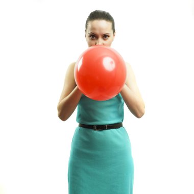 Young girl inflating a balloon clipart