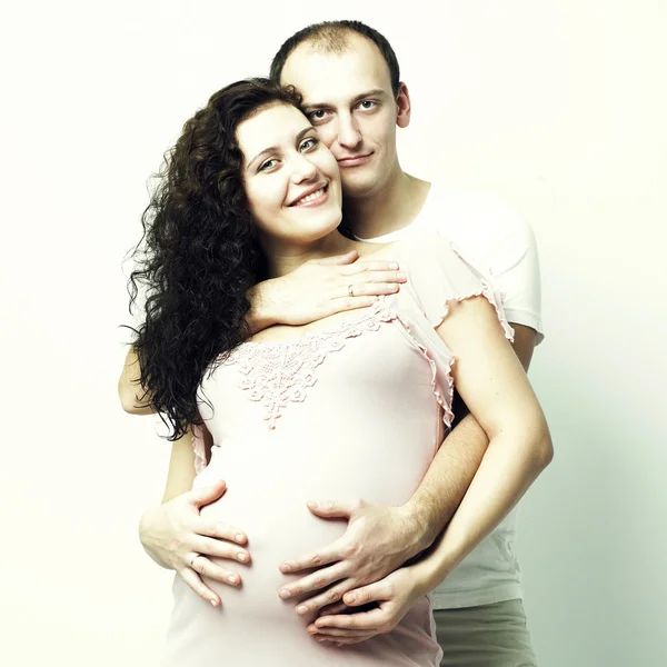 Boldog terhes asszony, férjével — Stock Fotó