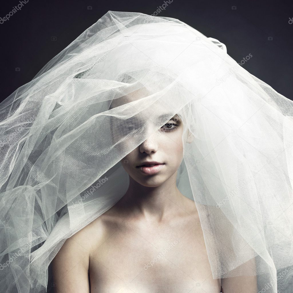 Beautiful girl in a veil