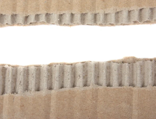 Corrugated cardboard border with a white — Stock Photo, Image
