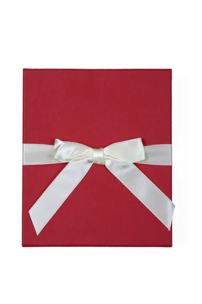 Kırmızı beyaz fiyonklu hediye paketi — Stok fotoğraf