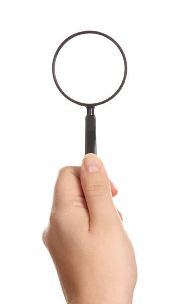 Magnifying glass in woman hand Stock Photo