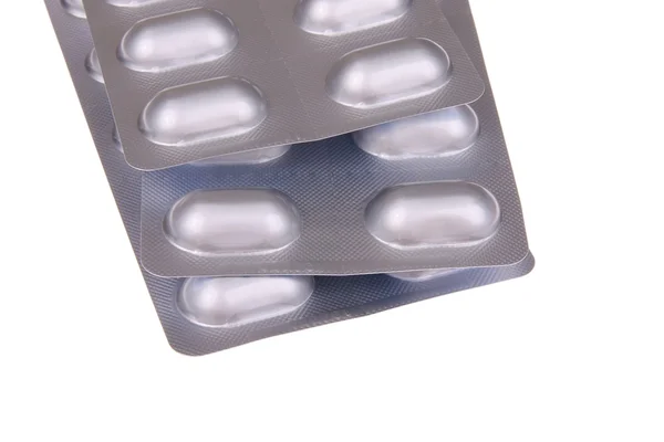 Drie verpakkingen van tabletten Rechtenvrije Stockafbeeldingen