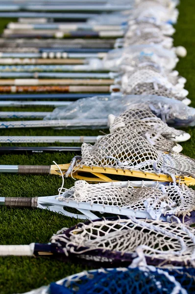 Cabeças de lacrosse no chão — Fotografia de Stock