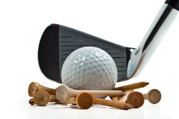 Plancha con pelotas de golf y te Imagen De Stock