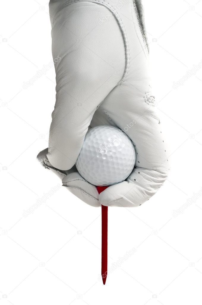 White golve, golf ball and red tee