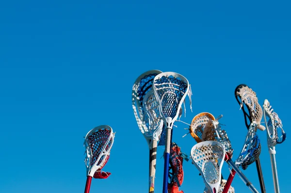 Many lacrosse sticks in the air — Stock Photo, Image