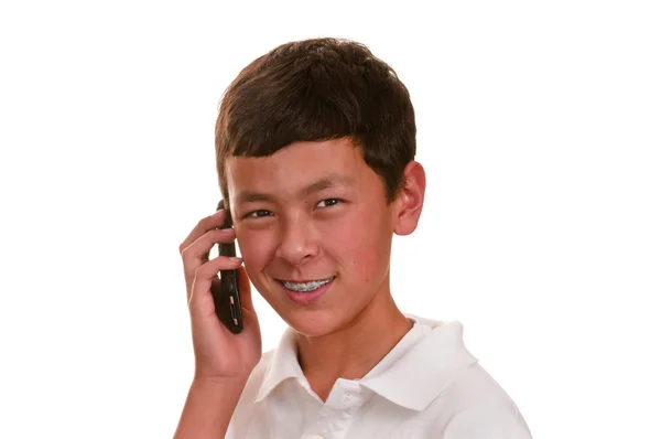 Unsure teen on cellular telephone (cellphone) — Stock Photo, Image