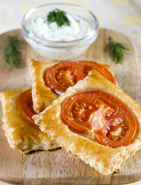 Flaky baked with tomatoes — Stock Photo, Image