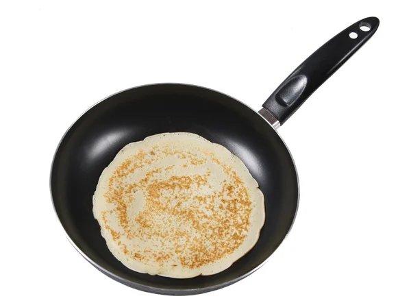 Frying a pancake cooking in a pan — Stock Photo, Image