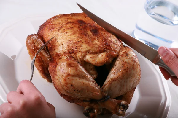 Carving Rotisserie chicken — Stock Photo, Image