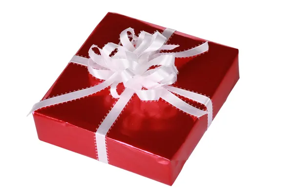 Rotes Geschenk mit weißer Schleife — Stockfoto