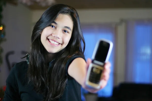 stock image Young teen girl holding cellphone