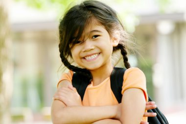 Adorable five year old girl ready for first day of school; clipart