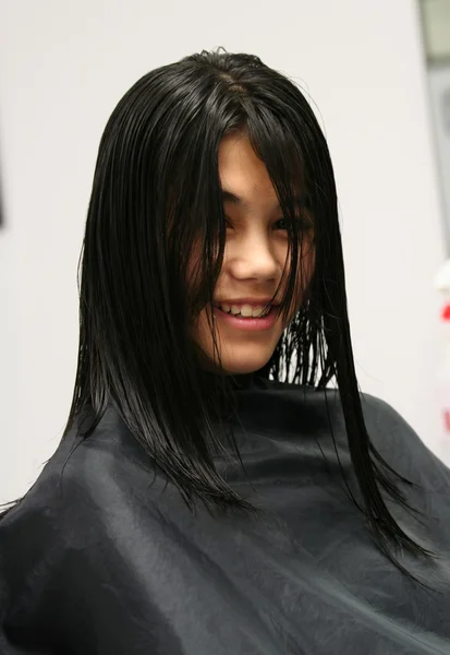 stock image Young teen girl getting haircut