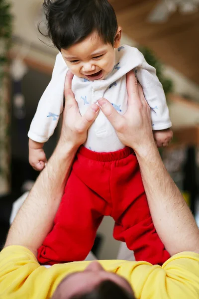 Baby boy playing with his father — Stock Photo, Image