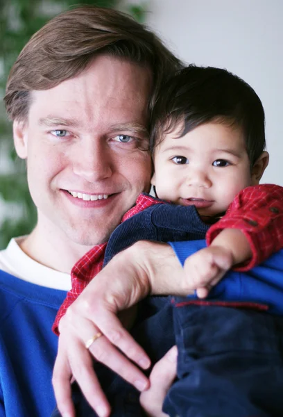 Father holding his baby boy — Stock Photo, Image