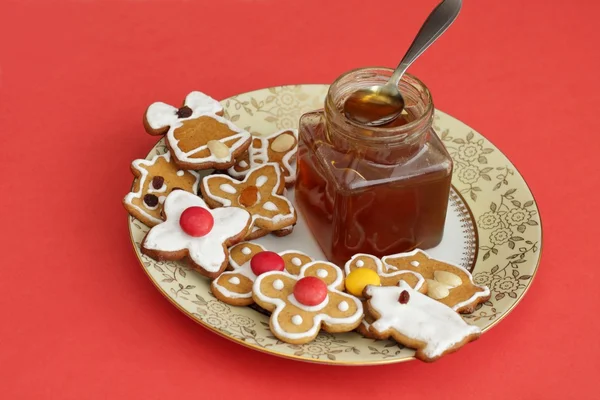 ख्रिसमस जिंगरब्रेड आणि मध — स्टॉक फोटो, इमेज