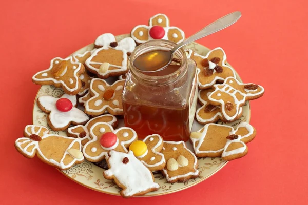 Christmas gingerbread and honey — Stock Photo, Image