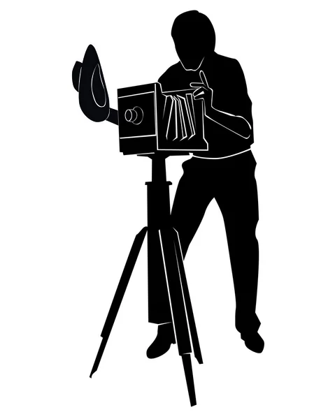 Silhouette of the photographer with the old camera — Stock Vector