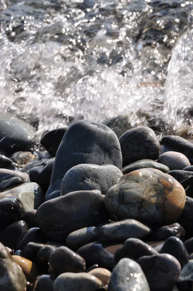 stock image Pebble and wave.