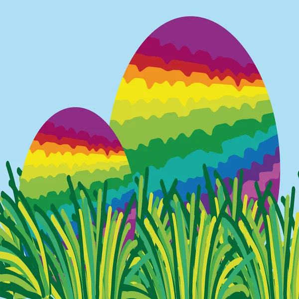 Dvě duhy velikonoční vajíčka ukrytá v trávě — Stock fotografie