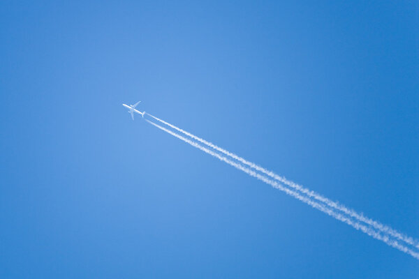 Airplane fly soar at blue sky