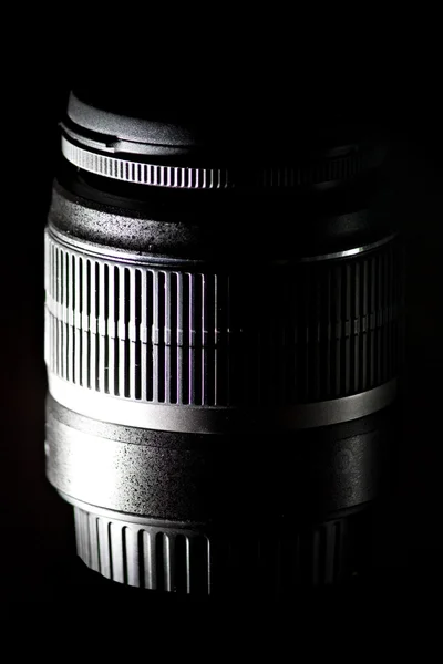 Low key telephoto zoom slr camera lens Stock Image