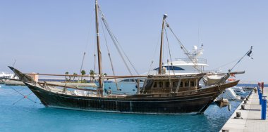 Rustic yacht in the Red Sea clipart