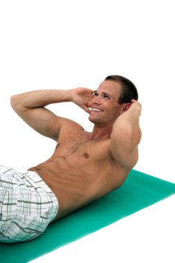 Happy man doing sit-ups clipart