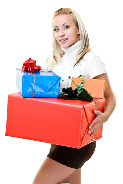 Cute woman holding present at christmas time — Stock Photo, Image