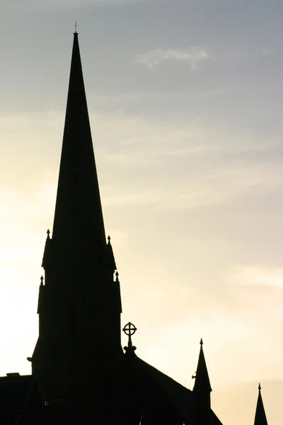 日没時の教会のシルエット — ストック写真