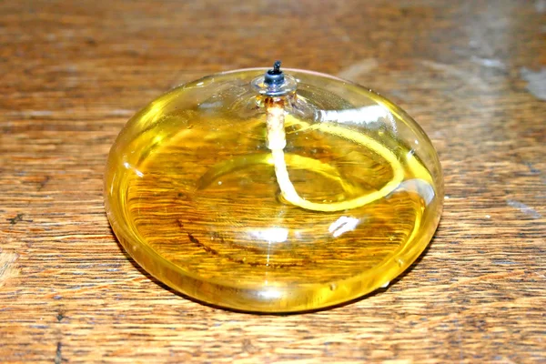Gele glas olielamp Stockafbeelding