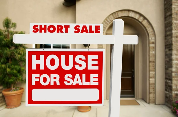 Red Short Sale Real Estate Sign and Home