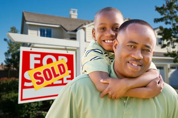 Father and Son and Sold Real Estate Sign — Stock Photo, Image