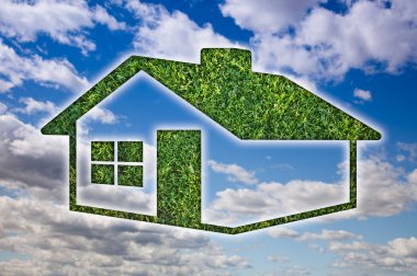 Green Grass House Icon Over Blue Sky clipart