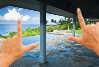 Hands Framing Breathtaking Ocean View clipart