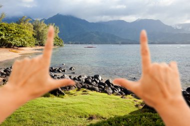 Hands Framing Beautiful Hanalei Bay Late clipart