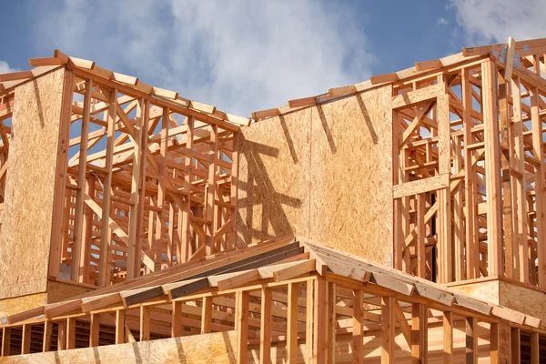 New Home Construction Framing and Clouds — Stock Photo, Image
