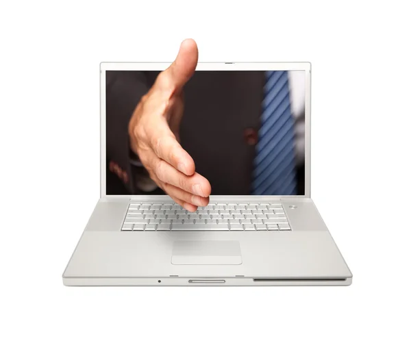Muž sáhl po handshake přes obrazovku — Stock fotografie