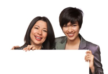 Attractive Multiethnic Mother and Daughter Holding Blank White Sign Isolate clipart