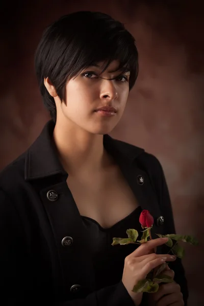 Pretty Multiethnic Young Adult Woman Holding a Single Rose Portrait with Se — Stock Photo, Image