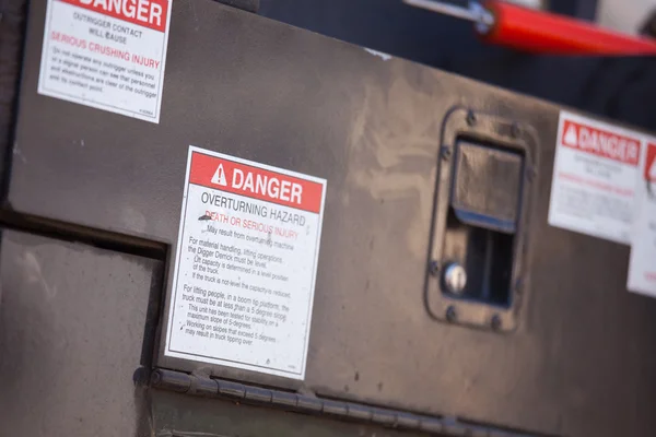 Overturning Hazard Danger Notice on Utility Truck. — Stock Photo, Image